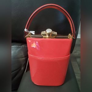 Patent Melon colored handbag